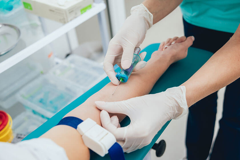 Nurse taking a little child blood sample. Medical equipment. Blood test