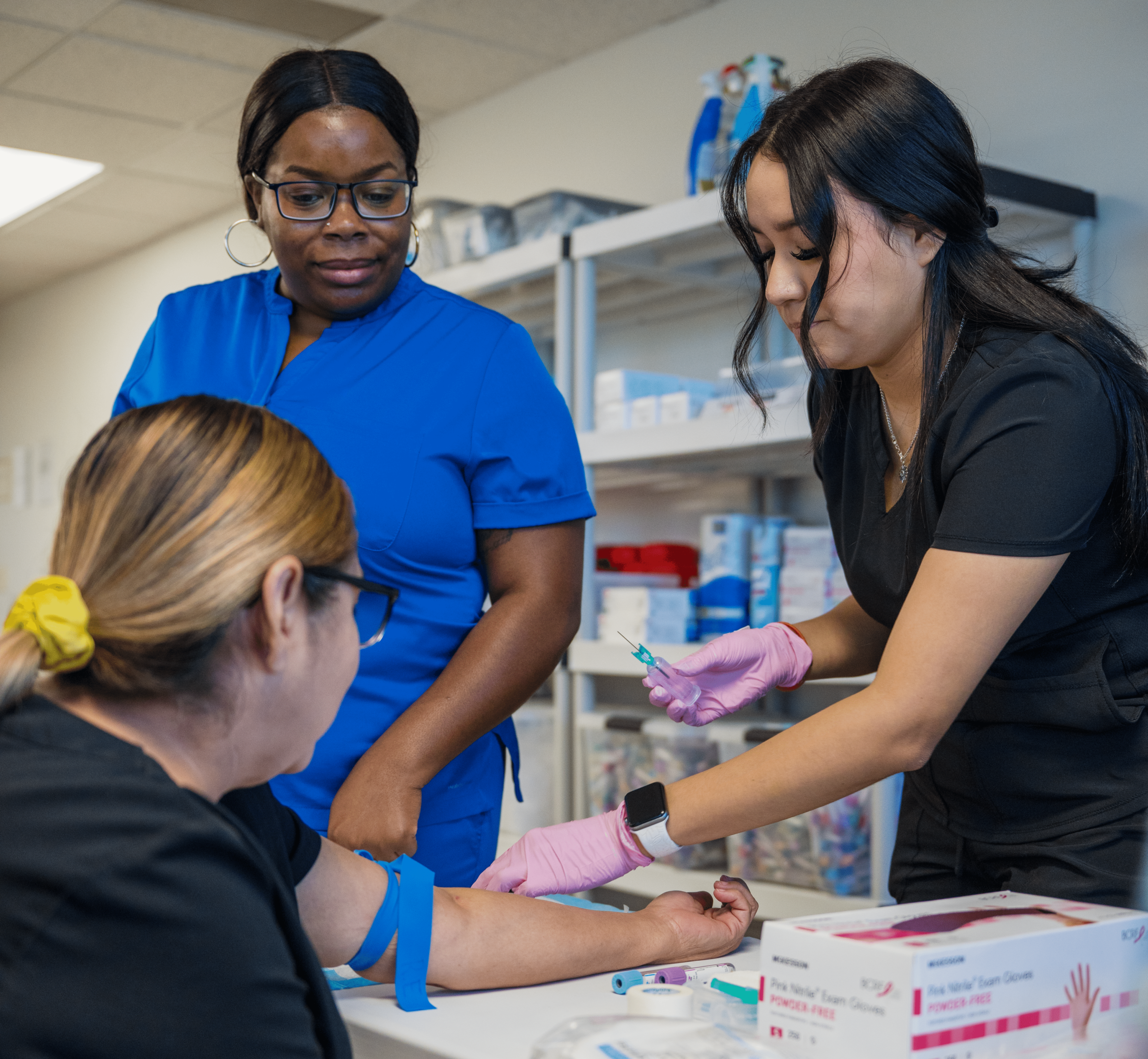 Phlebotomy Instructor Helping